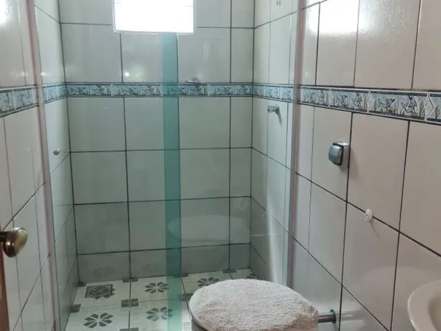 Imagem 16: Casa de 180 m² com 3 quartos (1 suíte), piscina, área gourmet e 4 vagas