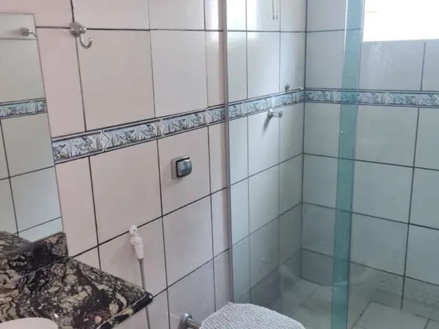 Imagem 4: Casa de 180 m² com 3 quartos (1 suíte), piscina, área gourmet e 4 vagas
