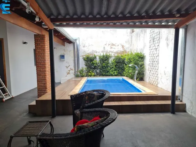Imagem 11: Casa de 180 m² com 3 quartos (1 suíte), piscina, área gourmet e 4 vagas