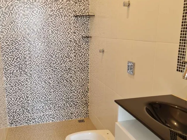 Imagem 2: Casa de 180 m² com 3 quartos (1 suíte), piscina, área gourmet e 4 vagas