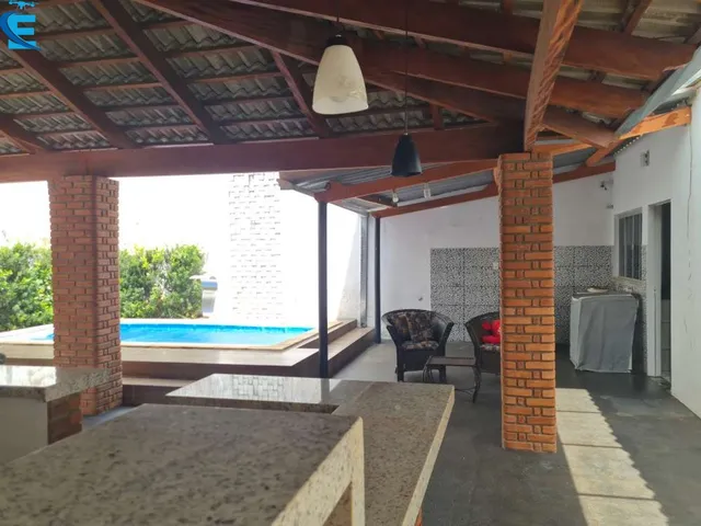 Imagem 9: Casa de 180 m² com 3 quartos (1 suíte), piscina, área gourmet e 4 vagas