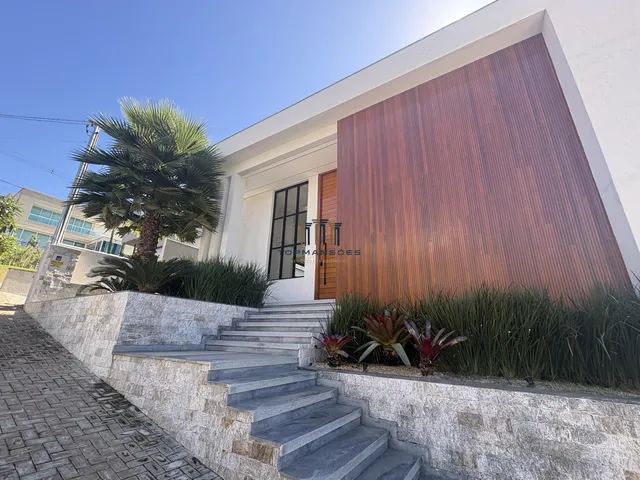 Imagem: Casa moderna linear com piscina em Condominio
