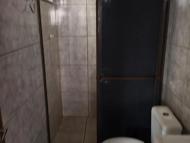 Imagem 9: Casa com 2 quartos, sala, cozinha, lavanderia, banheiro, garagem coberta