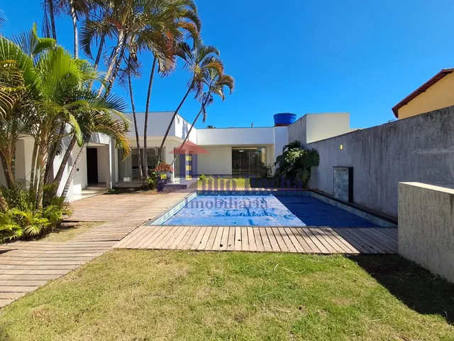 Imagem: A casa em condomínio possui 5 Dormitórios, 5 Suítes, 6 Banheiros