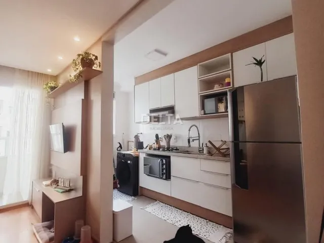 Imagem 10: Apartamento semimobiliado, com 02 dormitórios, sacada com churrasqueira, vaga de garagem