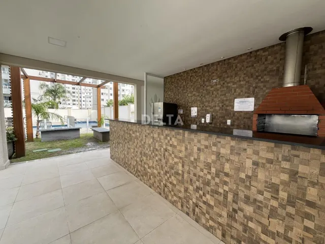 Imagem 16: Apartamento semimobiliado, com 02 dormitórios, sacada com churrasqueira, vaga de garagem