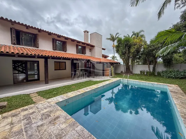Imagem 9: Oportunidade Única: Casa de 3 Quartos com Suíte e Garagem em Ipanema, Porto Alegre-Rs - 345,24M² de Área!