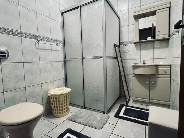 Imagem 11: Venha se encantar com esta maravilhosa casa semi-mobiliada no coração de Penha-SC!