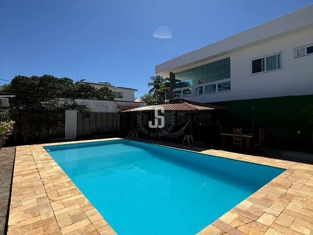 Imagem: A casa em condomínio possui 5 Dormitórios, 4 Suítes, 6 Banheiros