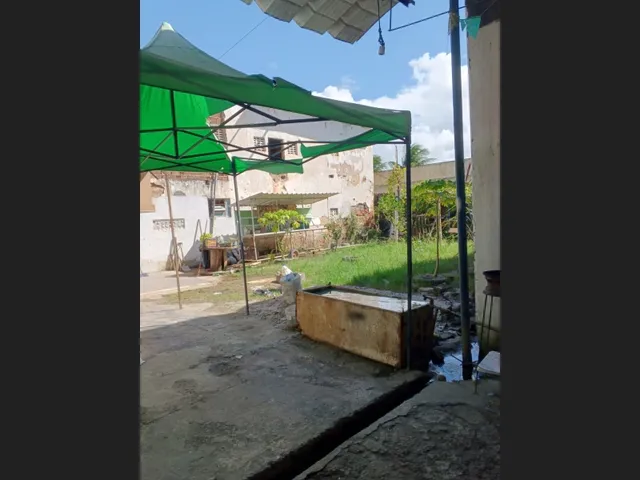 Imagem 3: Terreno com Estrutura Construída (Precisa de Reforma