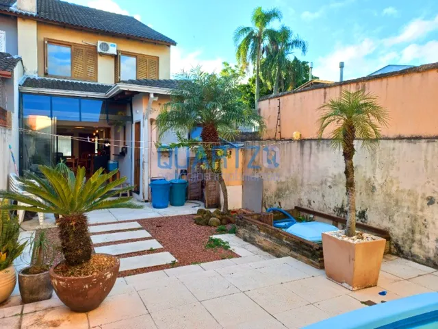 Imagem 15: CASA EM IPANEMA COM PISCINA, 3 DORM, SUITE, 204M², REFORMADA, LAREIRA E PARRILLA
