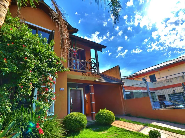 Imagem 6: Encontre Seu Refúgio em Porto Alegre: Linda Casa à Venda!