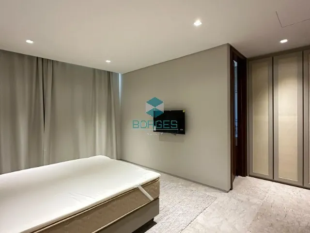 Imagem 7: Casa à venda com 375m², 5 suítes e arquitetura assinada no Condomínio Praia Bella