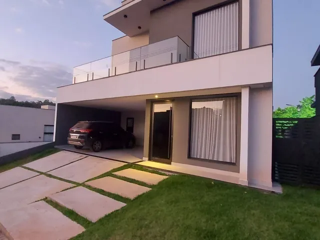Imagem: A casa possui 3 Dormitórios, 3 Suítes, 5 Banheiros, 4