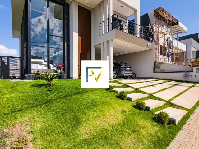 Imagem: A casa possui 3 Dormitórios, 3 Suítes, 5 Banheiros, 4