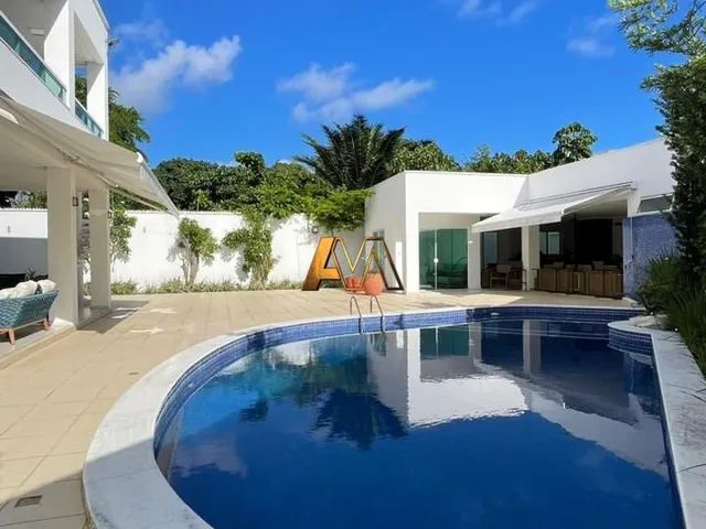 Imagem: A casa em condomínio possui 3 Dormitórios, 3 Suítes, 4 Banheiros