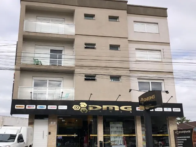 Imagem: O apartamento possui 2 Dormitórios, 1 Suíte, 2 Banheiros,