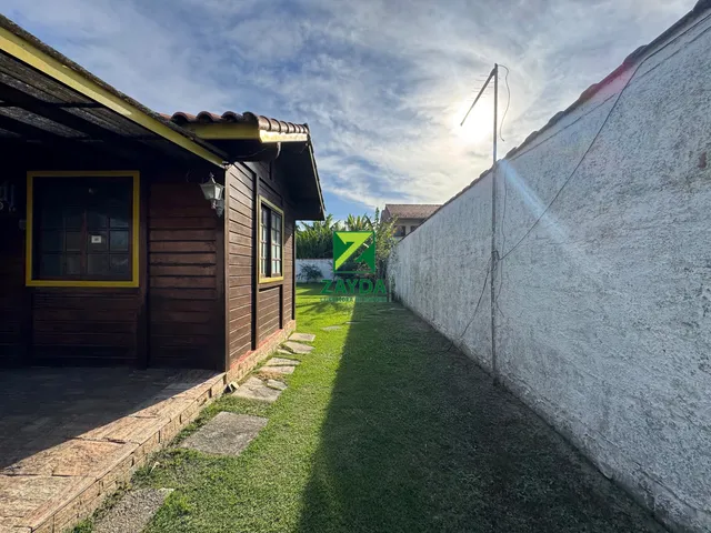 Imagem 15: Casa linear com 600m² de terreno, 03 quartos e amplo jardim gramado, no Bairro Peixe