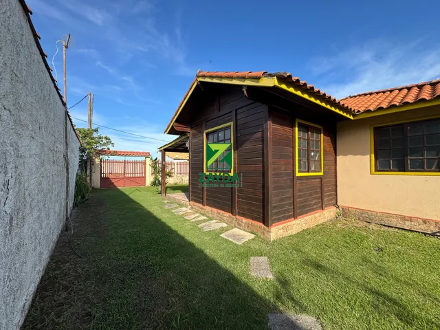 Imagem 14: Casa linear com 600m² de terreno, 03 quartos e amplo jardim gramado, no Bairro Peixe