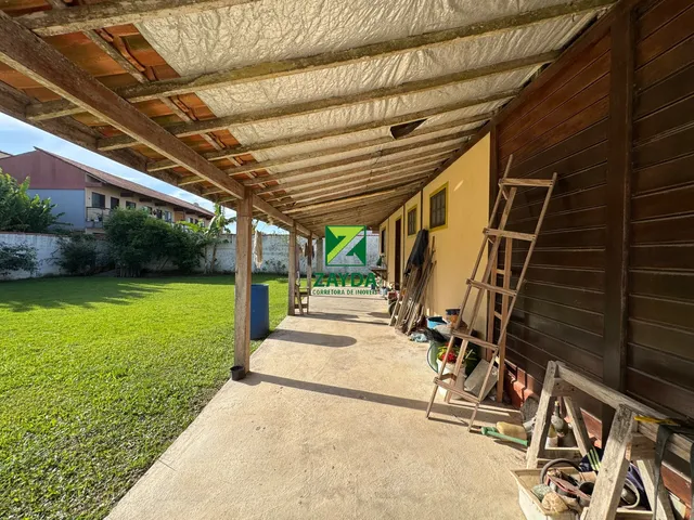 Imagem 16: Casa linear com 600m² de terreno, 03 quartos e amplo jardim gramado, no Bairro Peixe