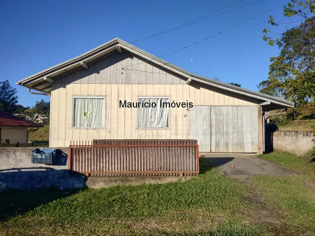 Imagem: Casa de madeira na Rua Rodolfo Greuel, Victor
