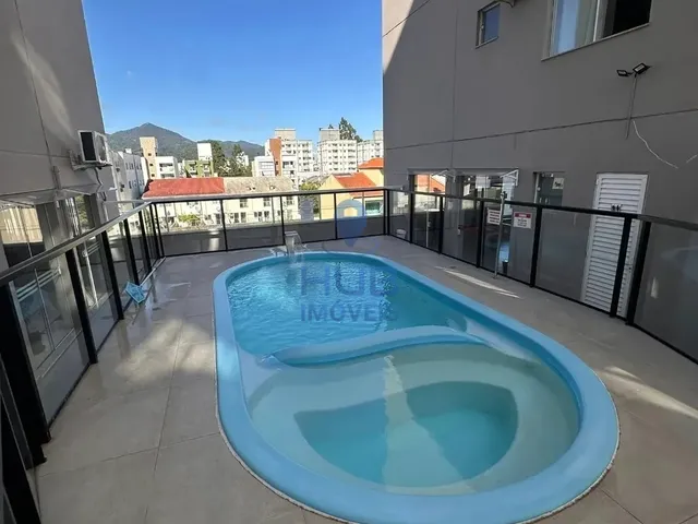 Imagem 7: Apartamento com 2 dormitórios sendo 1 suíte e 1 vaga de garagem em Camboriú/SC