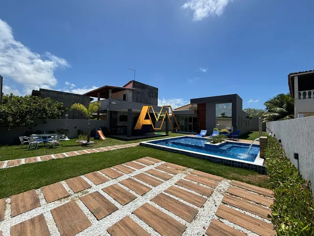 Imagem: A casa possui 3 Dormitórios, 2 Suítes, 2 Banheiros, 2