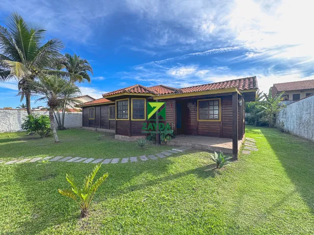 Imagem 1: Casa linear com 600m² de terreno, 03 quartos e amplo jardim gramado, no Bairro Peixe