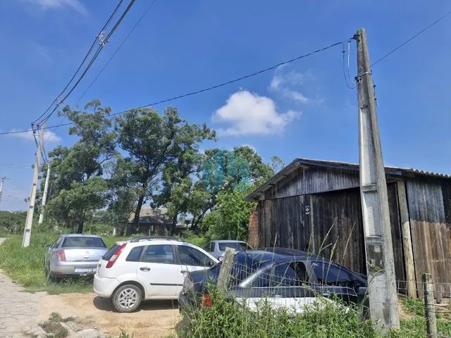 Imagem 2: Amplo Terreno a Poucos Minutos do Centro da Cidade, Próximo às Praias do Rosa e