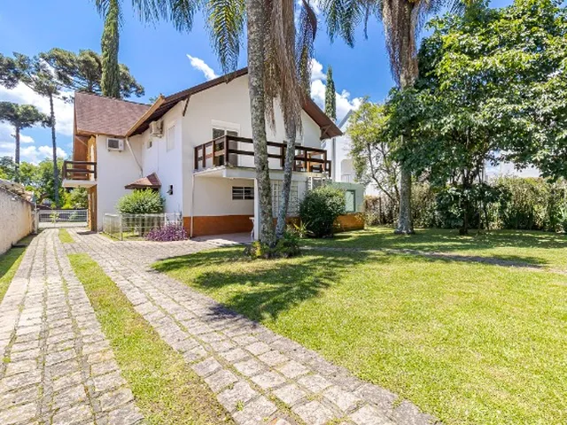 Imagem: A casa em condomínio possui 4 Dormitórios, 4 Suítes, 4