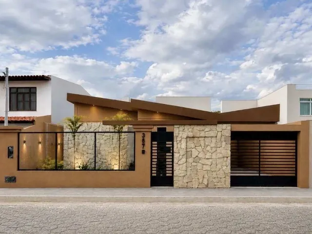 Imagem: A casa possui 3 Dormitórios, 1 Suíte, 2 Banheiros, 2