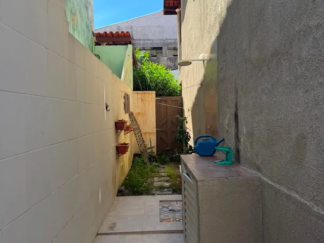 Imagem: A casa possui 3 Dormitórios, 2 Suítes, 3 Banheiros,