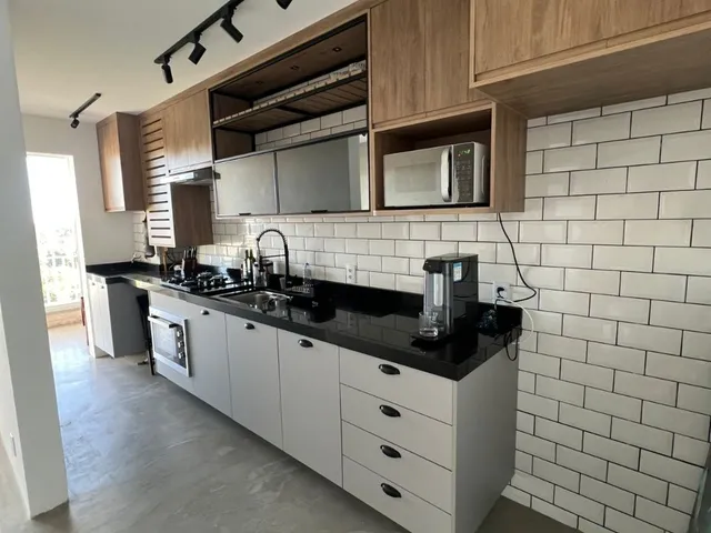 Imagem: O apartamento possui 2 Dormitórios, 1 Suíte, 2 Banheiros,