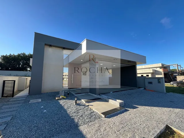 Imagem: A casa possui 3 Dormitórios, 3 Suítes, 2 Banheiros, 2
