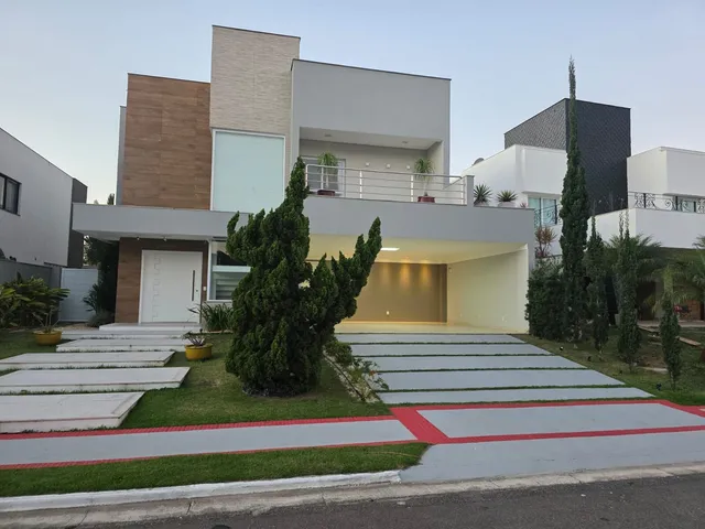 Imagem: A casa possui 4 Dormitórios, 4 Suítes, 6 Banheiros, 3
