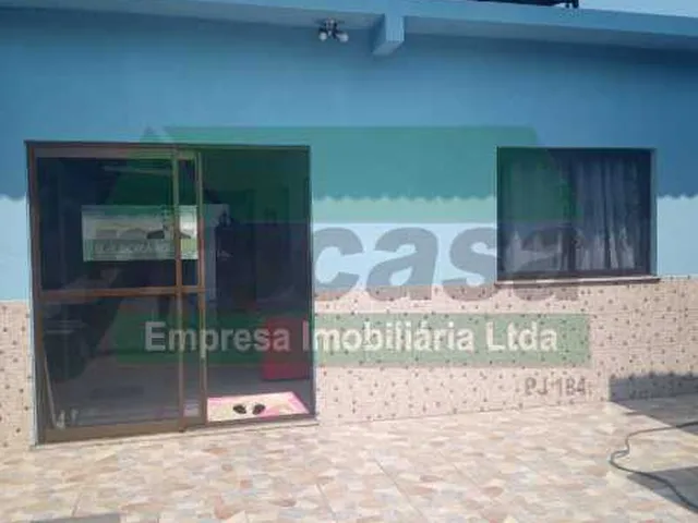 Imagem: A casa possui 2 Dormitórios, 1 Suíte, 1 Banheiro, 3 Vagas