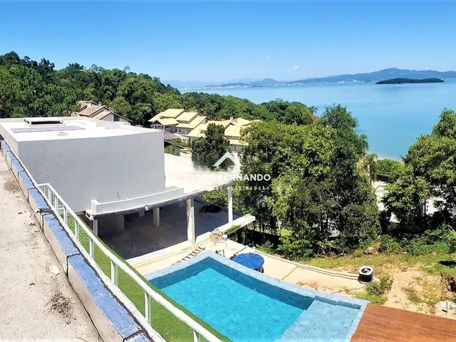 Imagem: A casa possui 5 Dormitórios, 5 Suítes, 7 Banheiros, 4 Vagas