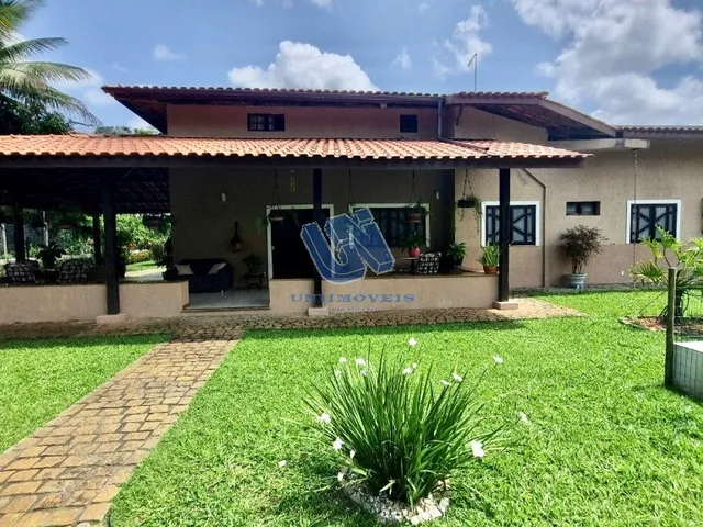 Imagem: A casa em condomínio possui 4 Dormitórios, 3 Suítes, 4 Banheiros