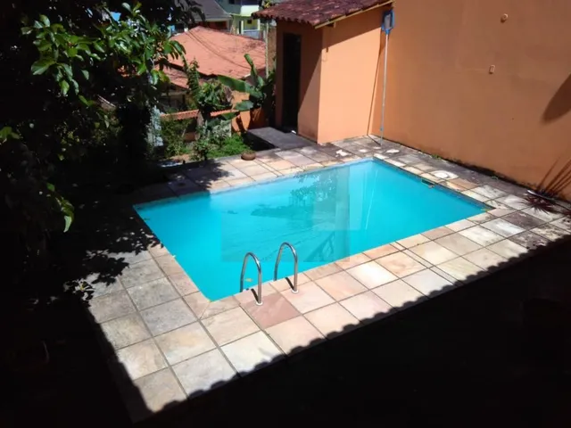 Imagem: A casa possui 3 Dormitórios, 1 Suíte, 2 Banheiros, 1 Vaga