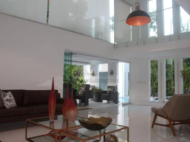 Imagem: A casa em condomínio possui 5 Dormitórios, 5 Suítes, 1