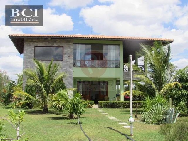 Imagem: A casa possui 4 Dormitórios, 3 Suítes, 5 Banheiros, 5 Vagas