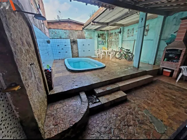 Imagem 6: Casa com 2 pavimentos, ponto comercial, piscina e 3 quartos com suíte. Aproveite esta