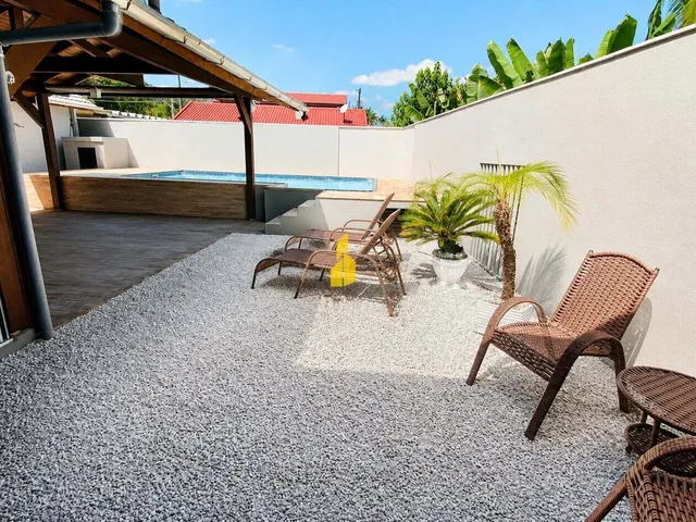 Imagem 11: Casa de alto padrão com piscina aquecida, semimobiliada e espaço comercial em