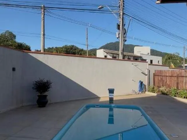 Imagem 6: Sobrado Encantador no Bairro Amizade, com Piscina e Área de Festas