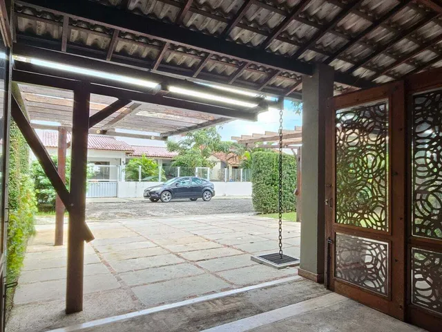 Imagem 2: Casa no Cypress Garden com Piscina, Lago e Área Verde