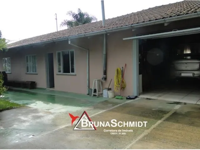 Imagem: A casa possui 2 Dormitórios, 2 Suítes, 4 Banheiros,