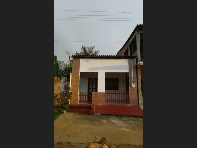Imagem: A casa possui 2 Dormitórios, Acomodam 4 pessoas e está