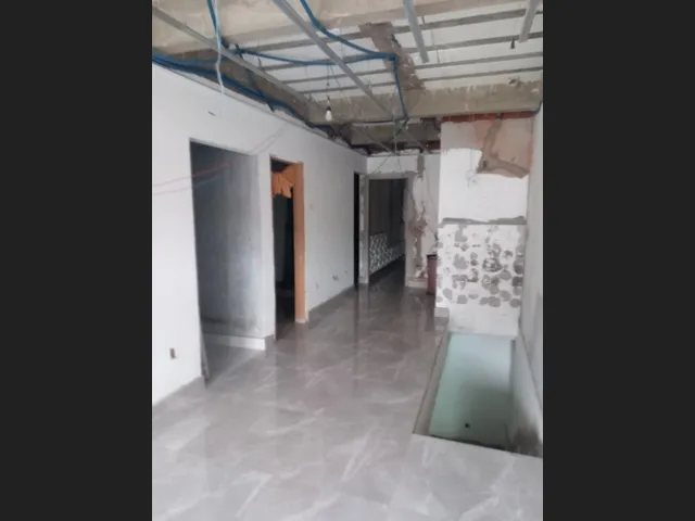Imagem 7: Casa com Três Pavimentos e Subsolo com Acabamento de Alto Padrão