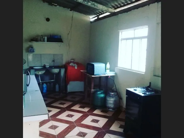 Imagem: A casa possui 2 Dormitórios, 1 Suíte, 3 Banheiros,