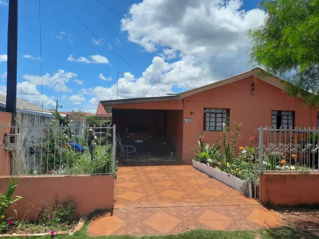 Imagem 3: Casa Toda Murada com Asfalto em Frente